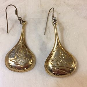 Gold tone hanging earrings